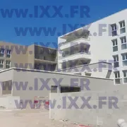 Chantier en cours avec gros œuvre avancé 04.2026