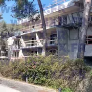Structure chantier balcons saillants consoles métalliques mur soutènement 03.2026