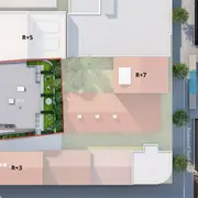 Disposition des bâtiments, espaces verts et accès sur le terrain du projet.