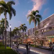 Espace piéton au cœur d'une résidence neuve en centre-ville, intégrant végétalisation et aménagement urbain.