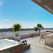 Grands espaces extérieurs avec mobilier et vue dégagée sur les collines.