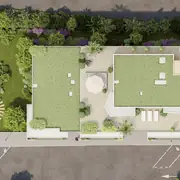 Jardins paysagers avec plantations variées, pelouses entretenues et cheminements piétonniers confortables.