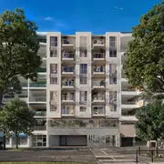 Façade extérieure de la résidence avec accès par ascenseur desservant tous les étages.