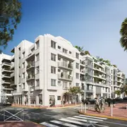 Bâtiment moderne proposant de généreux espaces extérieurs privatifs prolongés par des garde-corps en verre transparent.