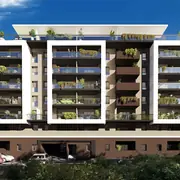 Vue extérieure principale montrant la façade contemporaine dotée de larges balcons et terrasses.
