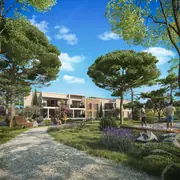 Espace paysager avec jeux et allées ombragées favorisant la détente et les rencontres.