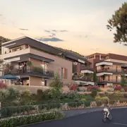 Bâtiment en harmonie avec l’environnement naturel, proposant des espaces extérieurs privatifs.