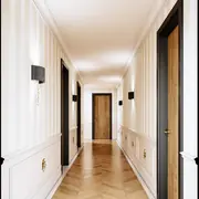 Chambre spacieuse avec rangements intégrés et décoration claire.