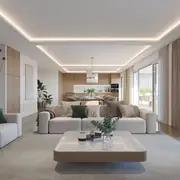 Double séjour moderne ouvert sur terrasse avec détails d’éclairage soignés.