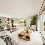 Le séjour aux volumes généreux bénéficie d'un apport naturel de lumière grâce à de larges baies vitrées. L'aménagement intérieur contemporain se prolonge fluidement vers l'extérieur.